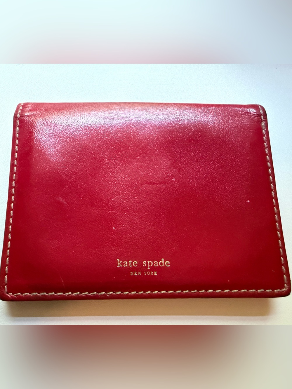 kate spade red leather card wallet with gold logo